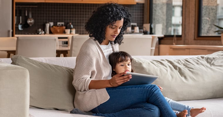 mom and daughter on the couch